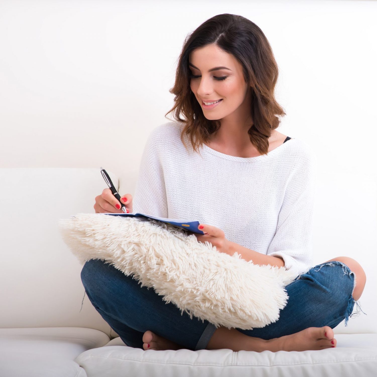 A beautiful young woman on the couch